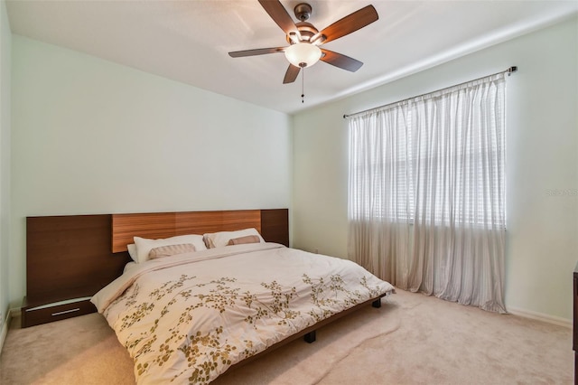 bedroom featuring carpet flooring and a ceiling fan