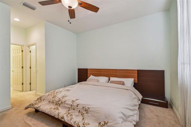 bedroom with recessed lighting, light colored carpet, visible vents, a ceiling fan, and baseboards