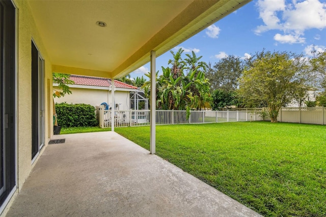 view of yard with a fenced backyard and a patio