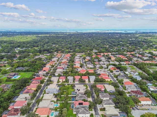 bird's eye view with a water view and a residential view