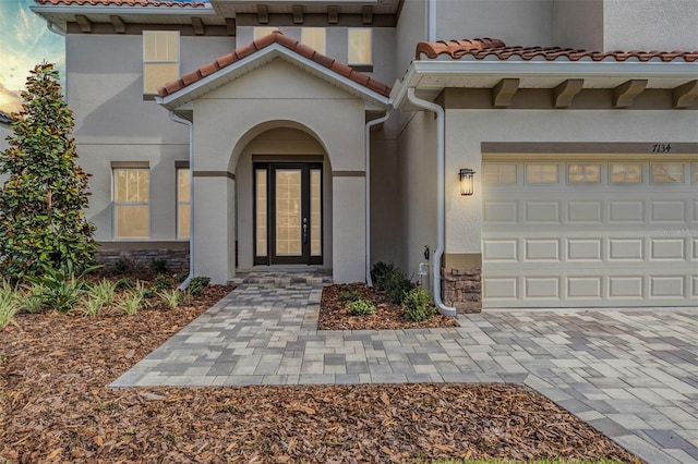 property entrance featuring a garage