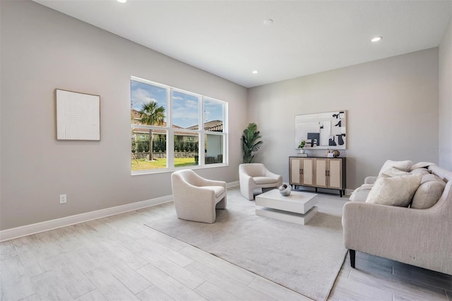 sitting room featuring light hardwood / wood-style floors