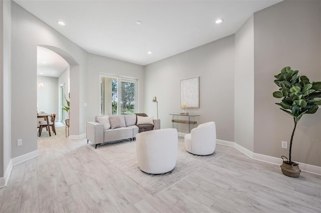 living room with light hardwood / wood-style floors