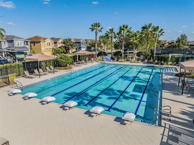 view of pool with a wooden deck