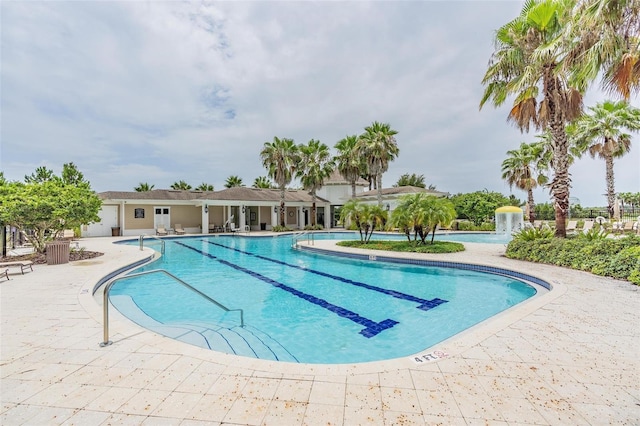 view of pool featuring a patio area