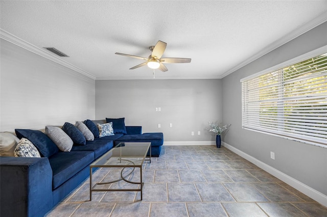 living room with ceiling fan, crown molding, and a textured ceiling