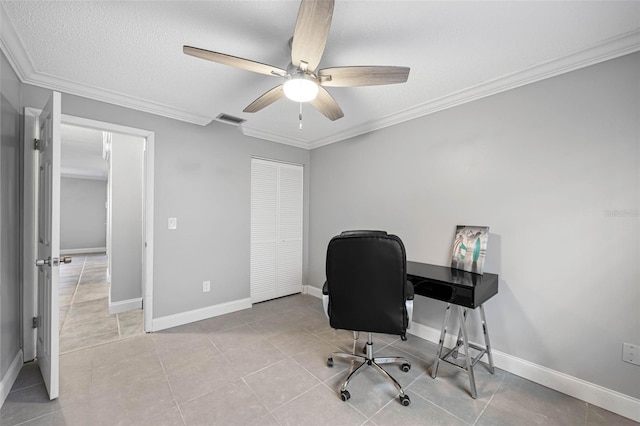 office featuring light tile patterned floors, a textured ceiling, ceiling fan, and ornamental molding