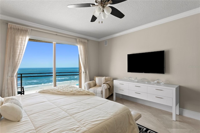 bedroom with baseboards, a textured ceiling, a ceiling fan, and crown molding