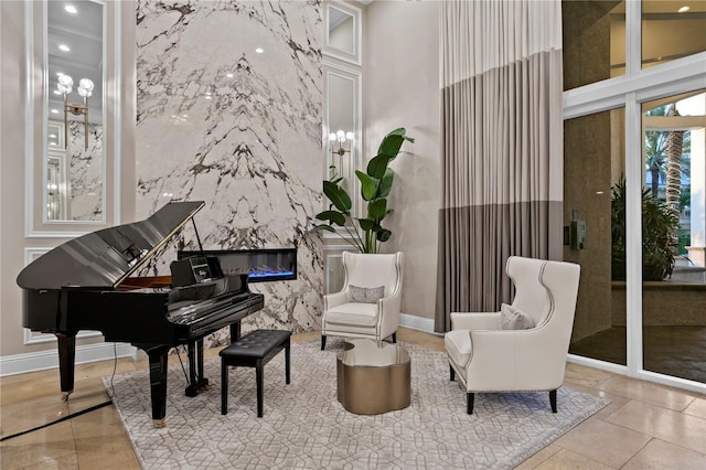 sitting room featuring baseboards