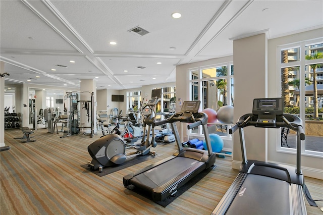 workout area with coffered ceiling and light carpet