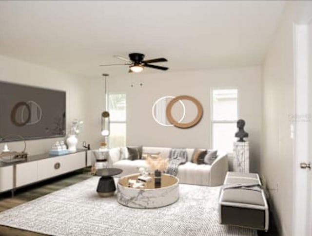 living room featuring ceiling fan and wood finished floors