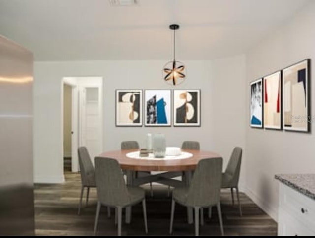 dining room with wood finished floors