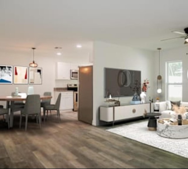 living area with recessed lighting, dark wood finished floors, and a ceiling fan