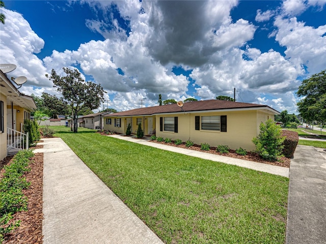 view of front of house with a front yard