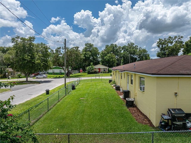 view of yard with central air condition unit