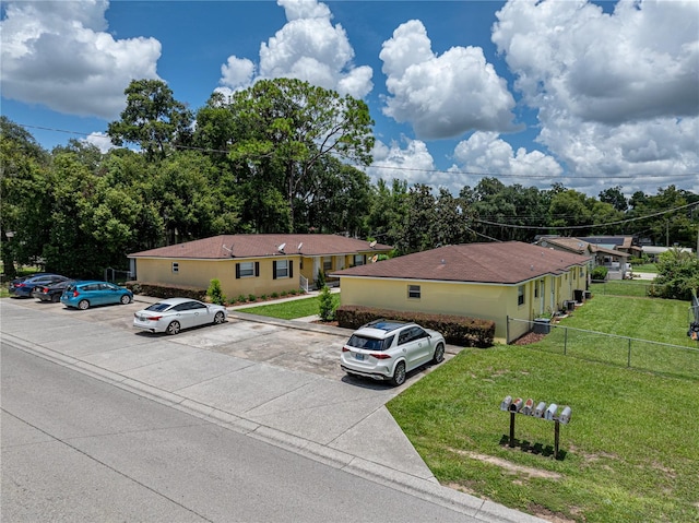 view of front of home with a front yard