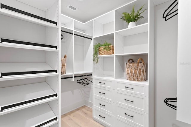 walk in closet featuring light wood-type flooring