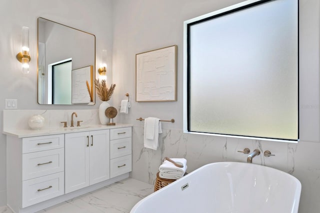 bathroom with tile walls, tile patterned floors, vanity, and a bath