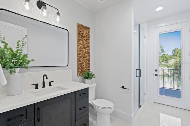 bathroom with walk in shower, vanity, tile patterned flooring, and toilet