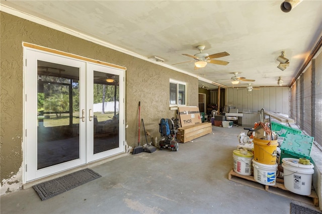 exterior space featuring ceiling fan