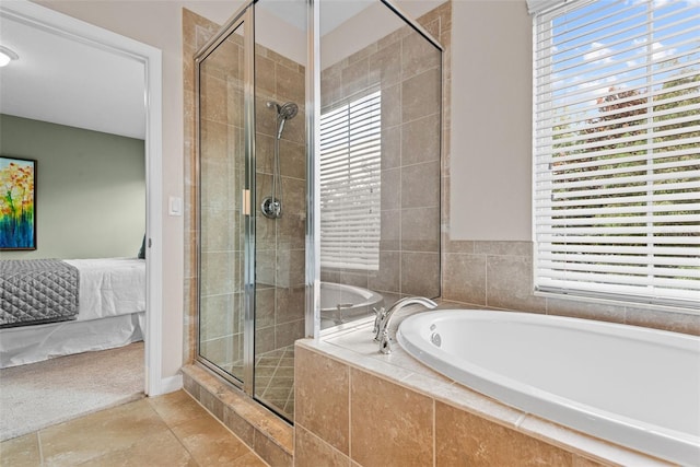 bathroom with plenty of natural light, independent shower and bath, and tile patterned floors