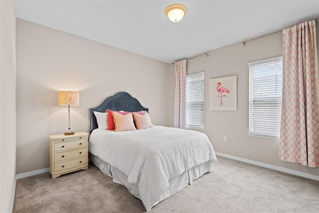 bedroom with light carpet