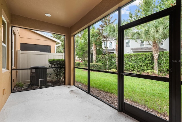 unfurnished sunroom featuring a wealth of natural light