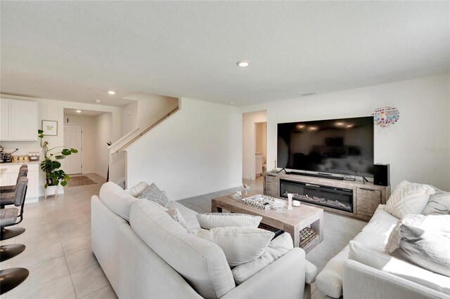 living room featuring light tile patterned floors