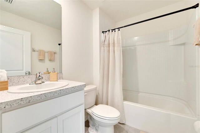 full bathroom with toilet, shower / tub combo with curtain, vanity, and tile patterned flooring