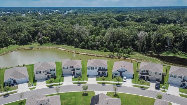 drone / aerial view with a water view