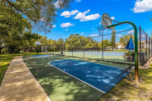 view of basketball court with tennis court