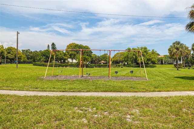 view of play area with a yard