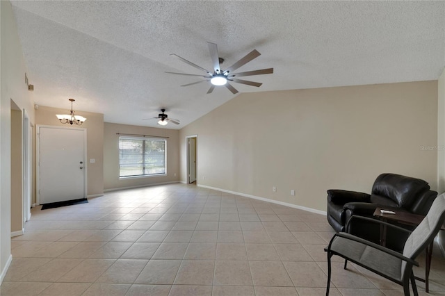 sitting room featuring vaulted ceiling, a textured ceiling, light tile patterned flooring, and baseboards