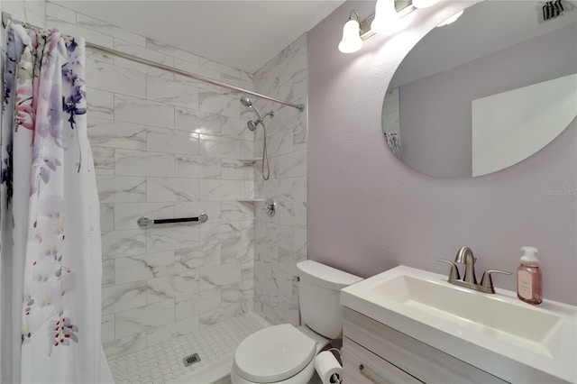 full bathroom with a textured wall, toilet, vanity, visible vents, and a stall shower