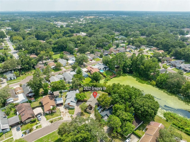 birds eye view of property with a residential view