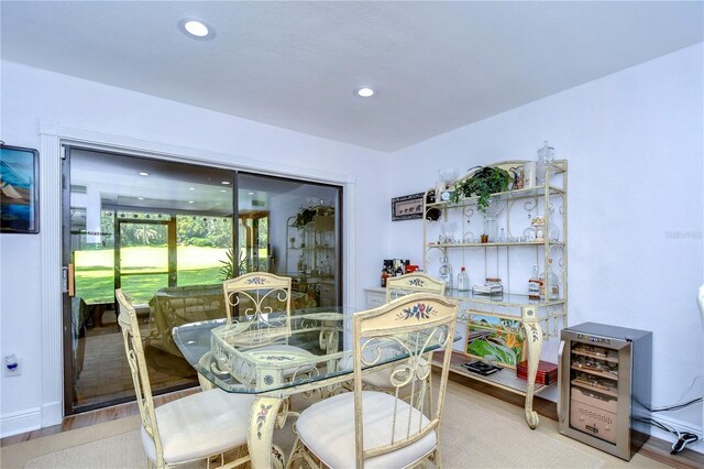 dining space with light wood-type flooring