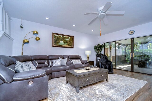 living room with ceiling fan, hardwood / wood-style flooring, and a wealth of natural light