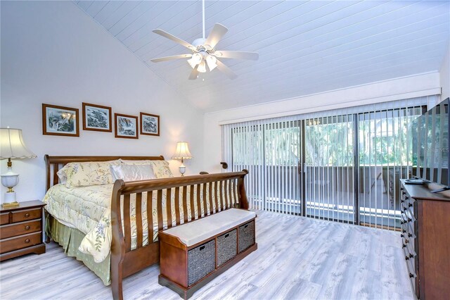 bedroom with light hardwood / wood-style floors, access to outside, high vaulted ceiling, and ceiling fan