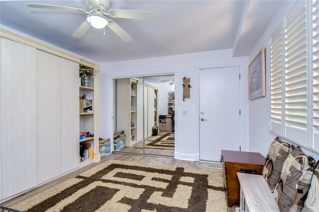 interior space featuring light hardwood / wood-style flooring and ceiling fan