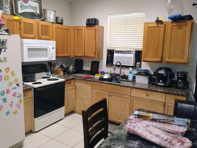 kitchen featuring dark stone counters, white appliances, sink, cooling unit, and light tile patterned flooring