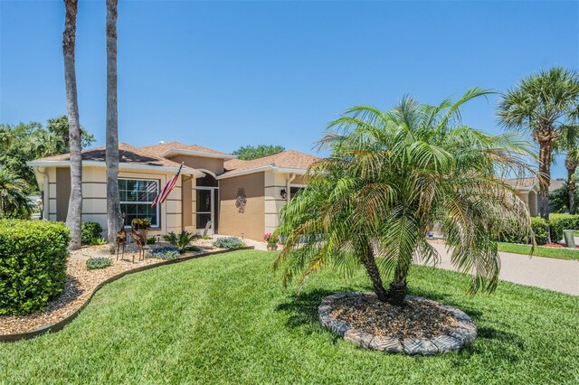 view of front of house with a front lawn