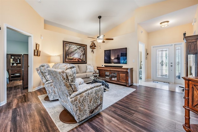 living room featuring ceiling fan, dark hardwood / wood-style flooring, and lofted ceiling