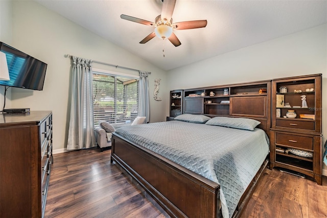 bedroom featuring dark hardwood / wood-style flooring, lofted ceiling, and ceiling fan