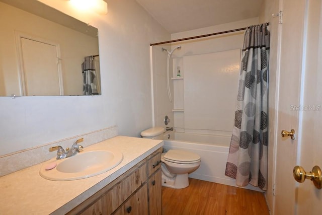 full bathroom with shower / bathtub combination with curtain, vanity, wood-type flooring, and toilet