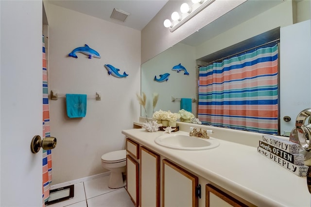 bathroom with a shower with curtain, tile patterned flooring, vanity, and toilet