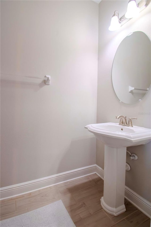 bathroom featuring hardwood / wood-style floors