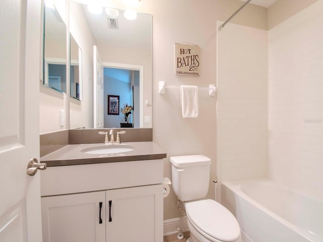 full bathroom with shower / washtub combination, vanity, and toilet