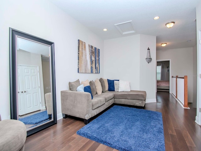 living room featuring dark hardwood / wood-style floors