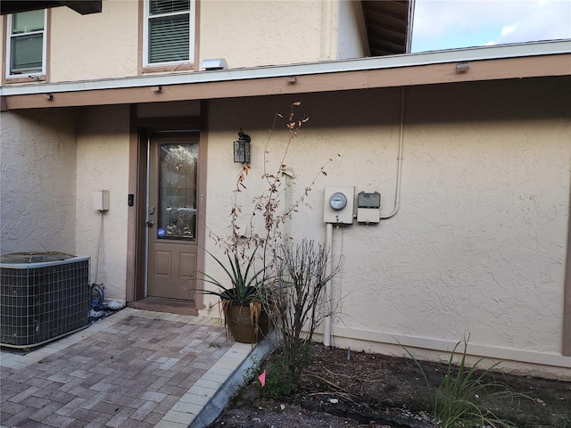 entrance to property with central air condition unit