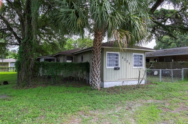 view of home's exterior featuring a yard